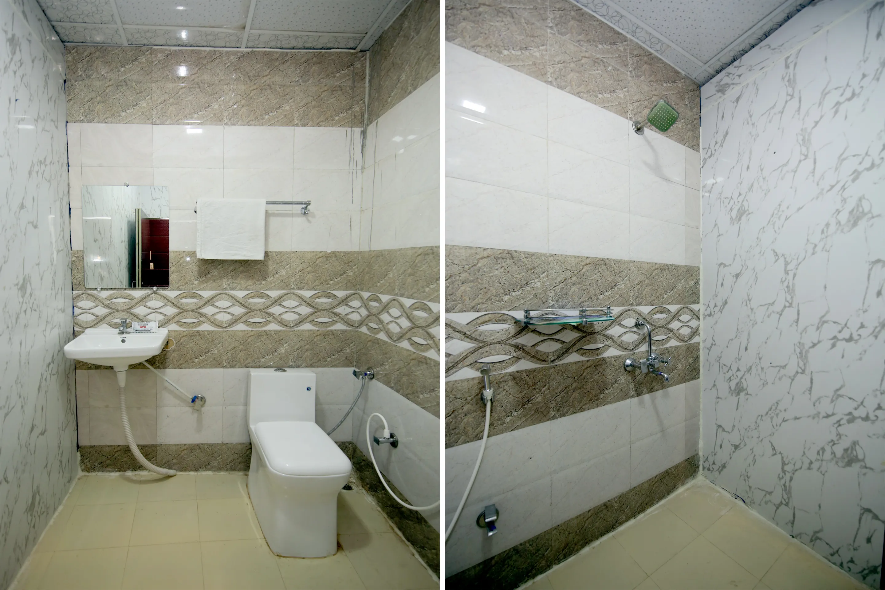 Clean attached bathroom with shower and geyser